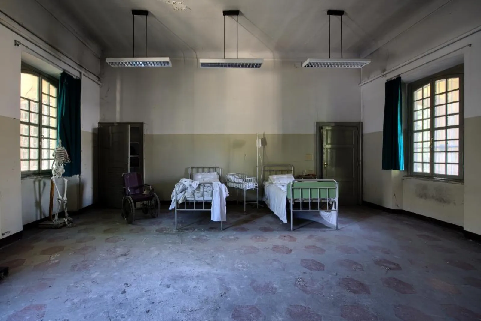 Empty hospital ward with beds