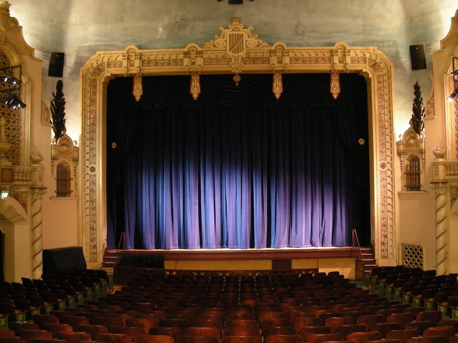 Theatre stage with a closed curtain